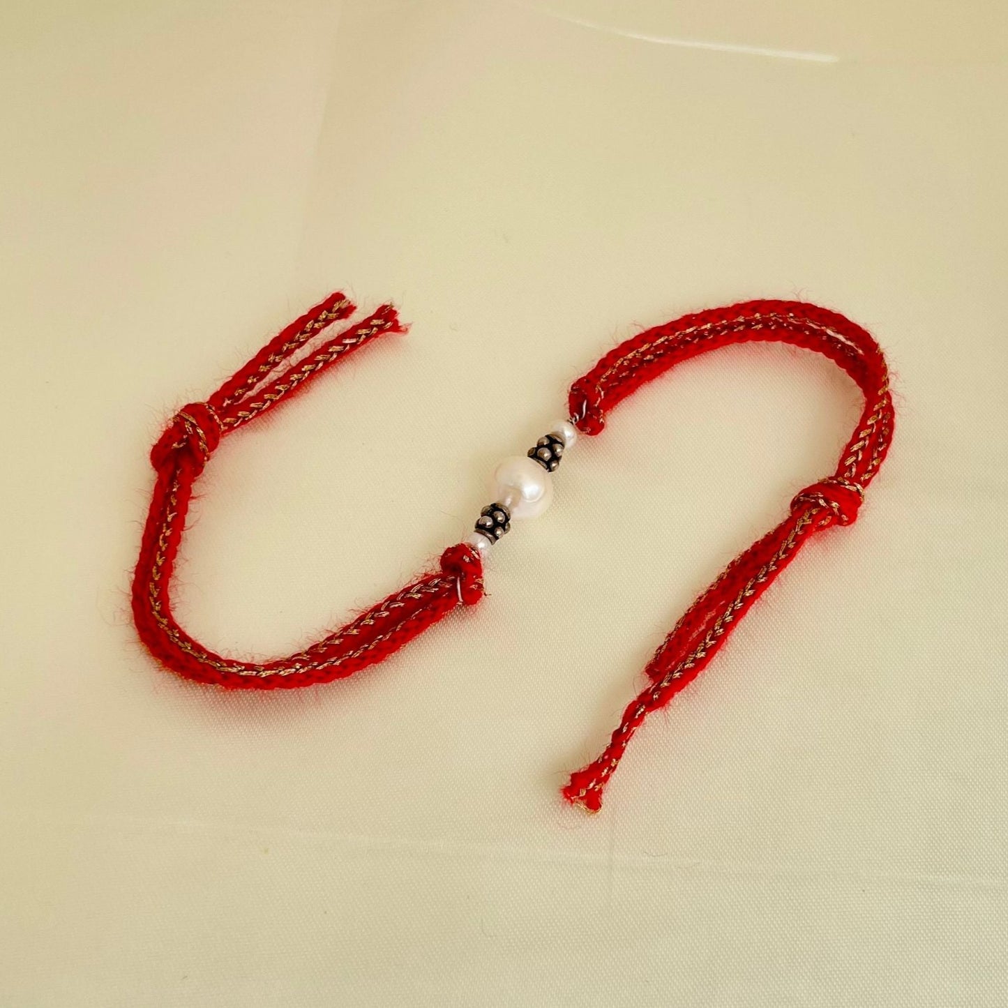 Sliver Beaded pearl Rakhi Collection - CherishBox