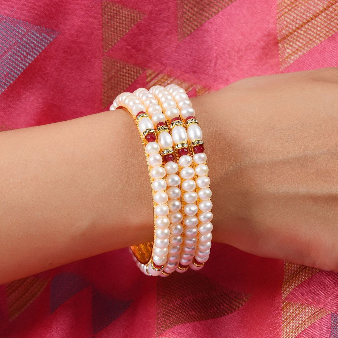 Buy Handcrafted Pearl Bangles with Red Stones in Gold Tone