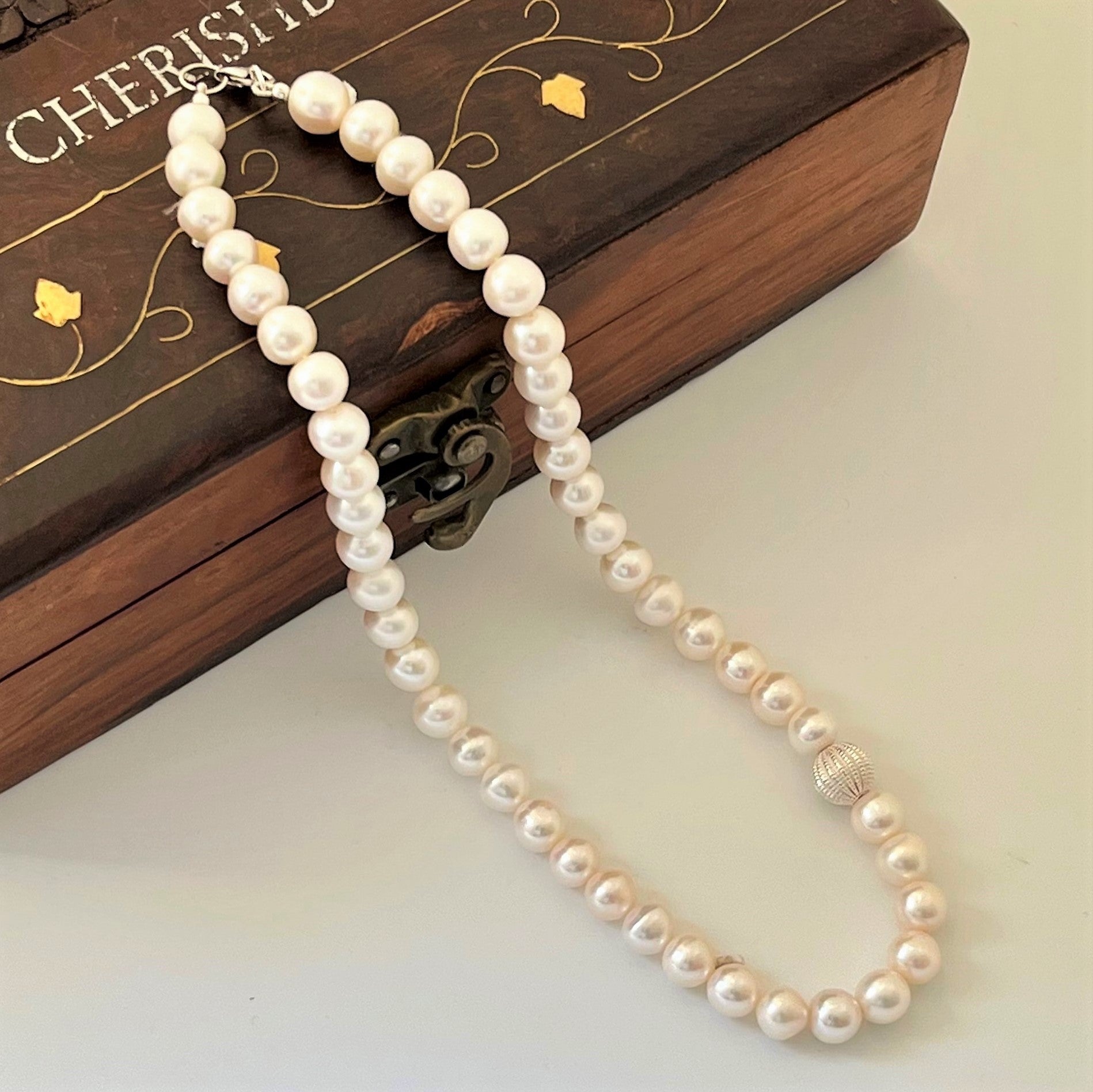 Pearl ball online necklace