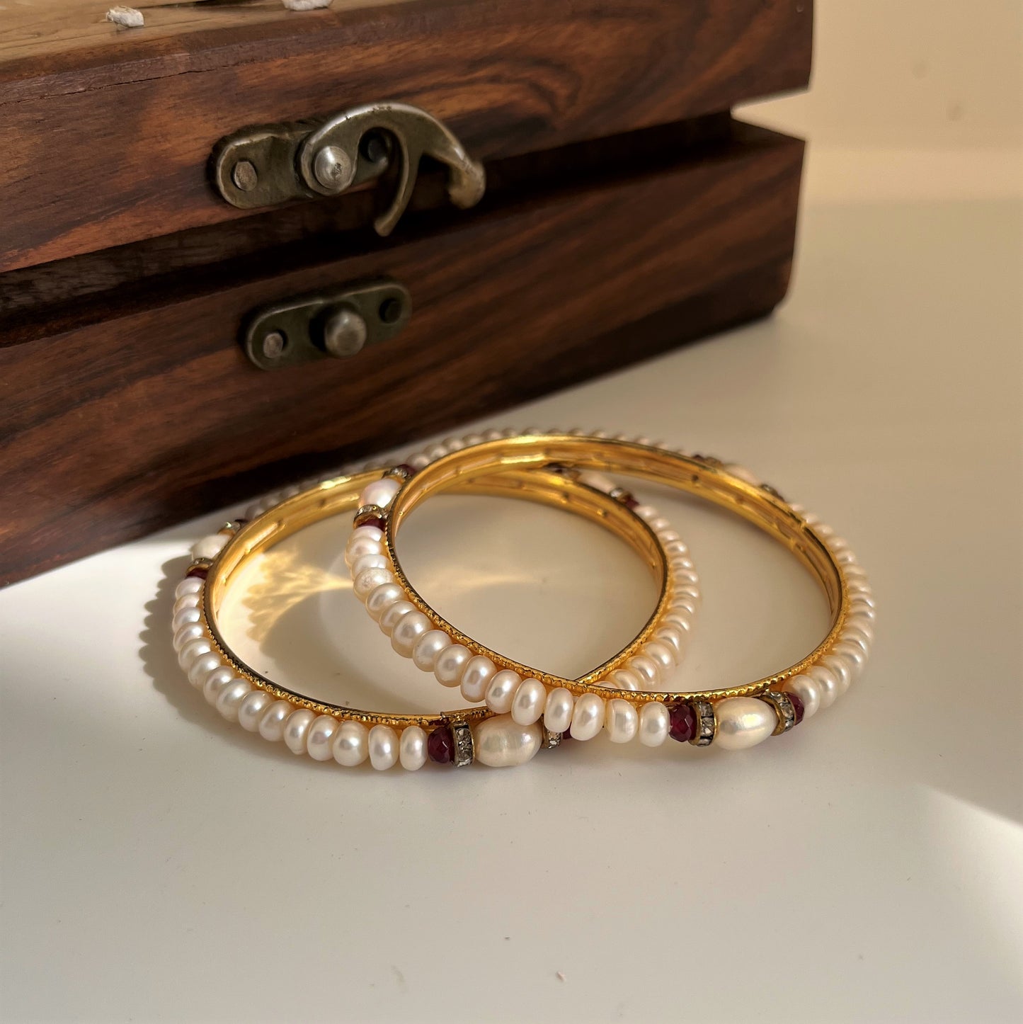1 pair of Pearl Bangles in Red Tone 