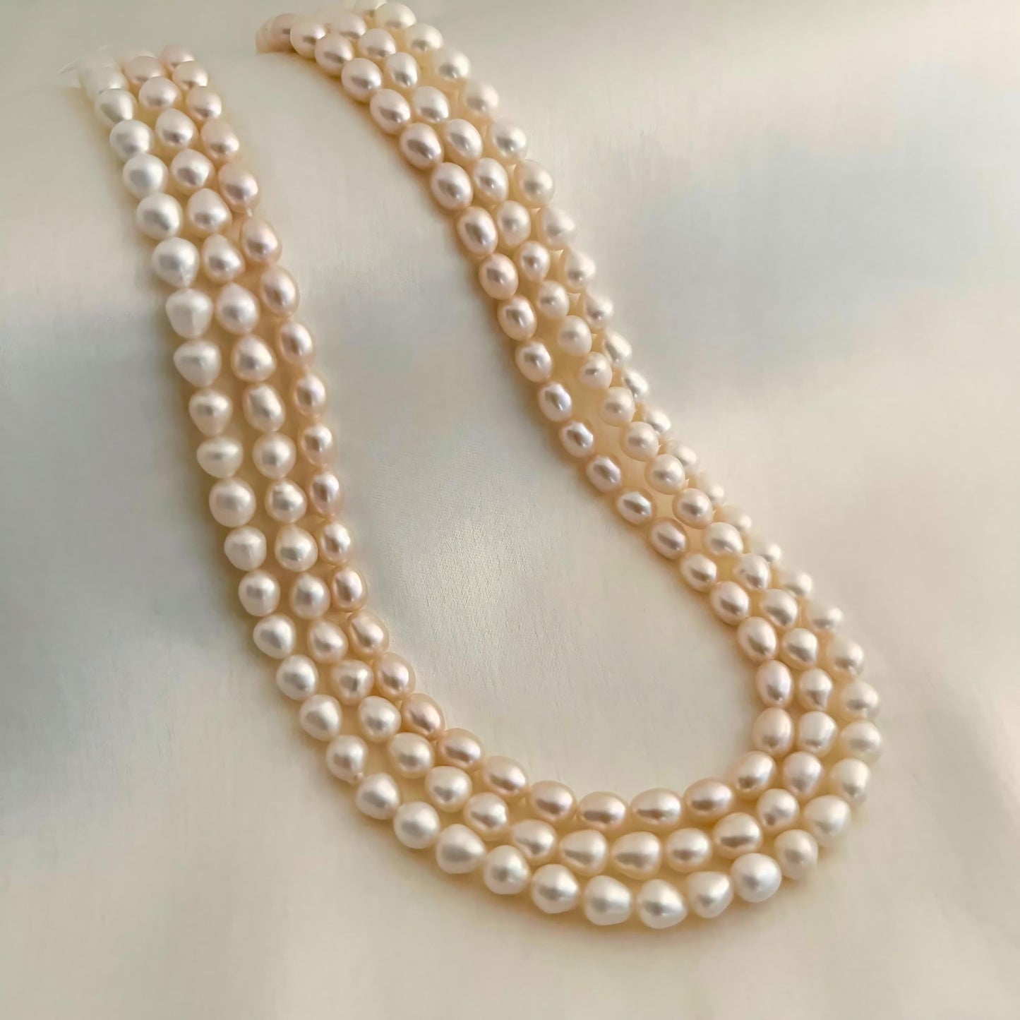 Three Layered White Oval Pearl Necklace