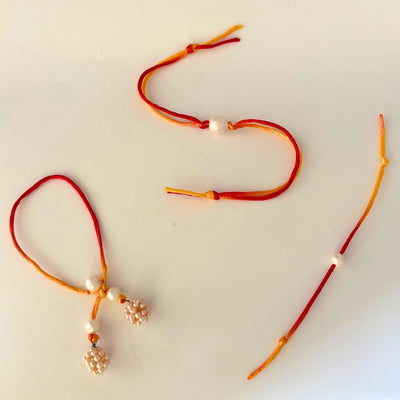 Pearl Legacy Bhaiya Bhabhi & Kids Rakhi Set in 92.5 Sterling Silver - CherishBox

