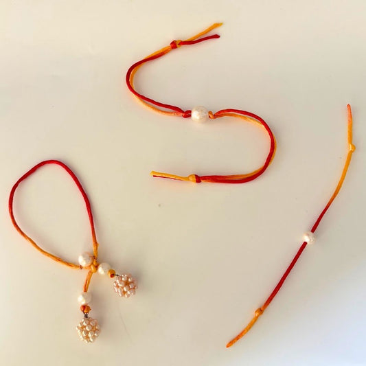Pearl Legacy Bhaiya Bhabhi & Kids Rakhi Set in 92.5 Sterling Silver - CherishBox
