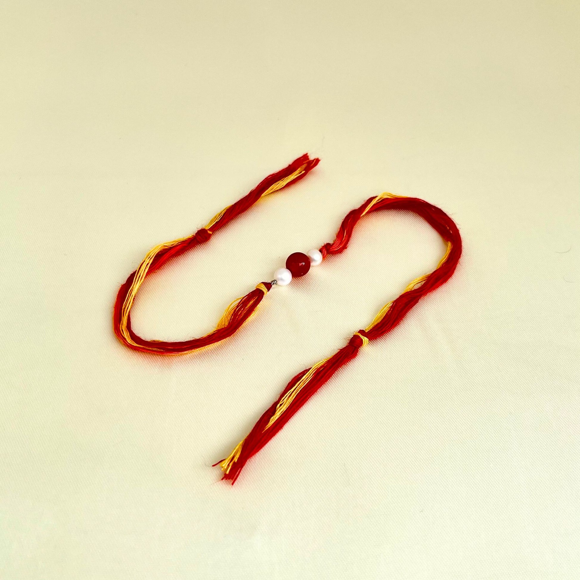 Carnelian Pearl Beaded Rakhi - CherishBox